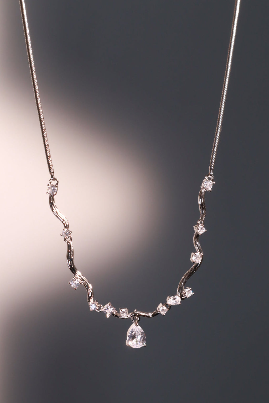Palladium White Gold Plated Spiral Drop Necklace