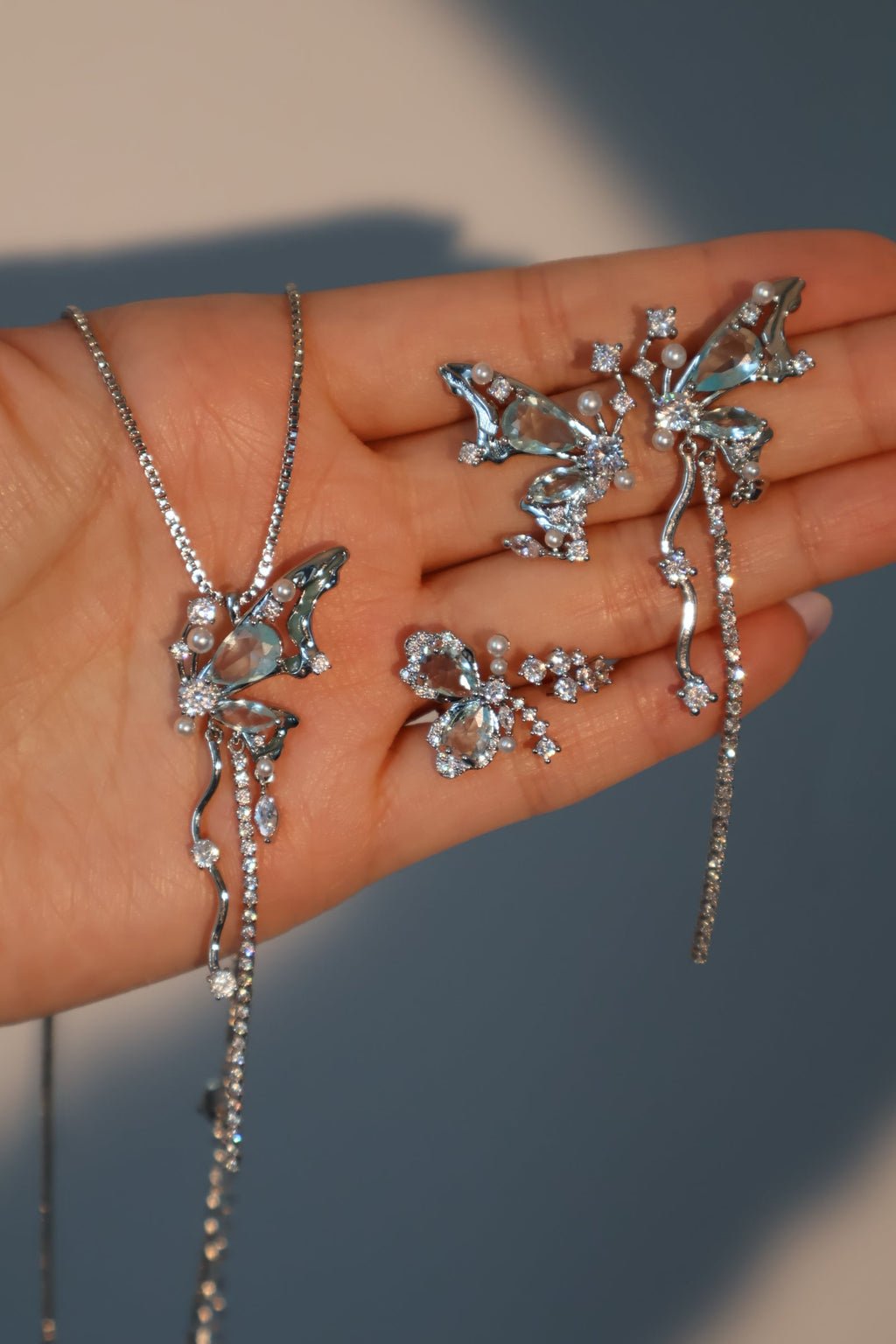 Palladium White Gold Plated Blue Gem Butterfly Earrings
