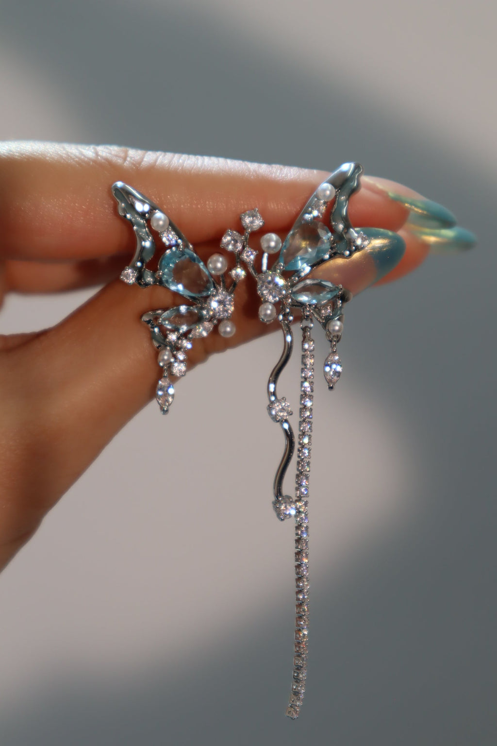 Palladium White Gold Plated Blue Gem Butterfly Earrings