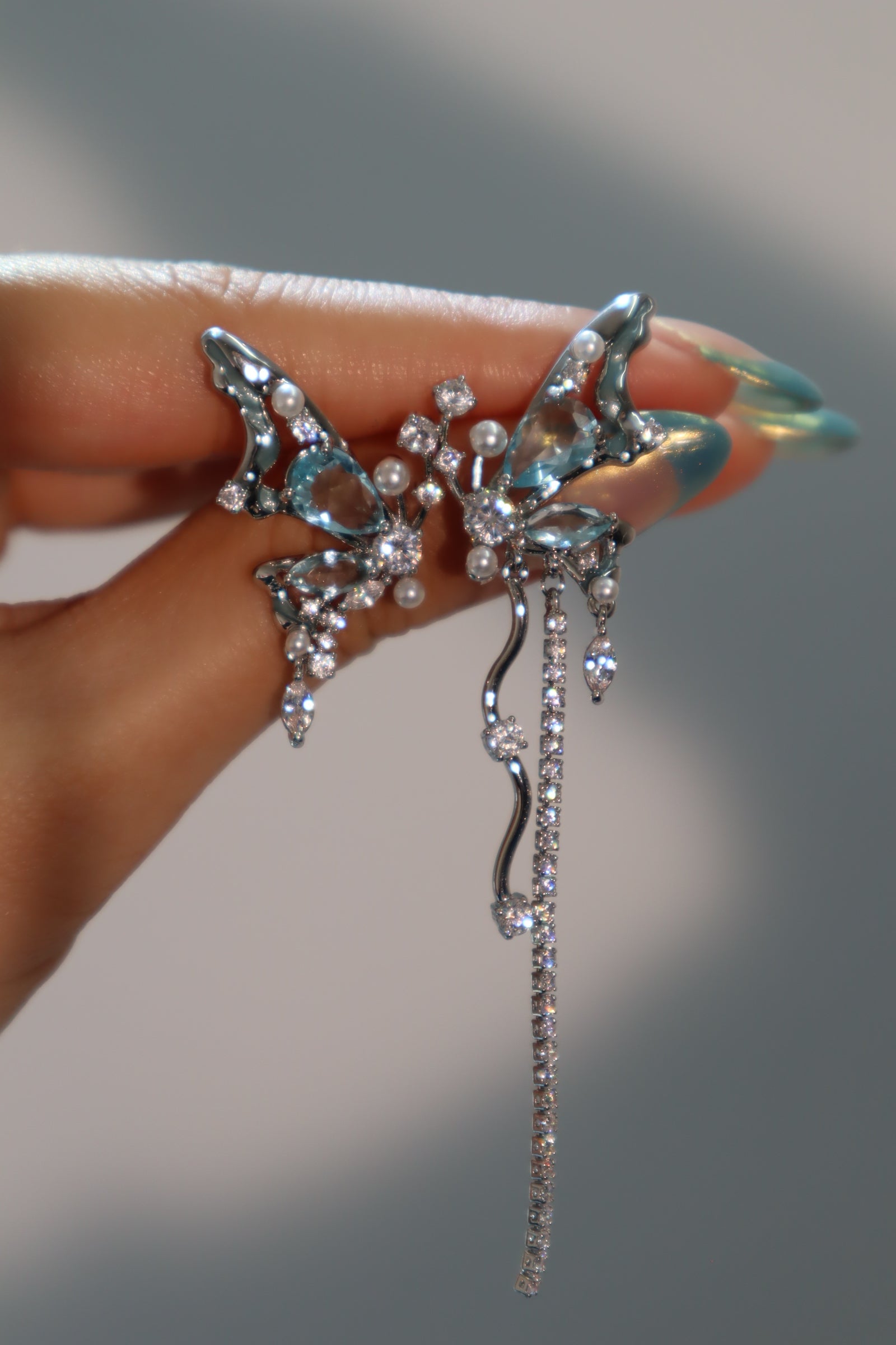 Palladium White Gold Plated Blue Gem Butterfly Earrings