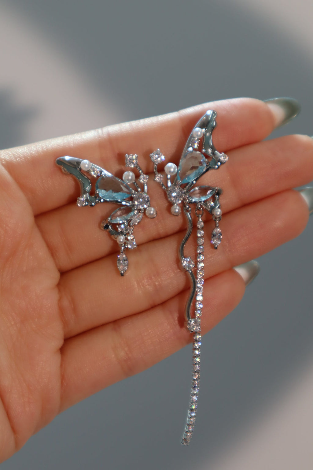 Palladium White Gold Plated Blue Gem Butterfly Earrings