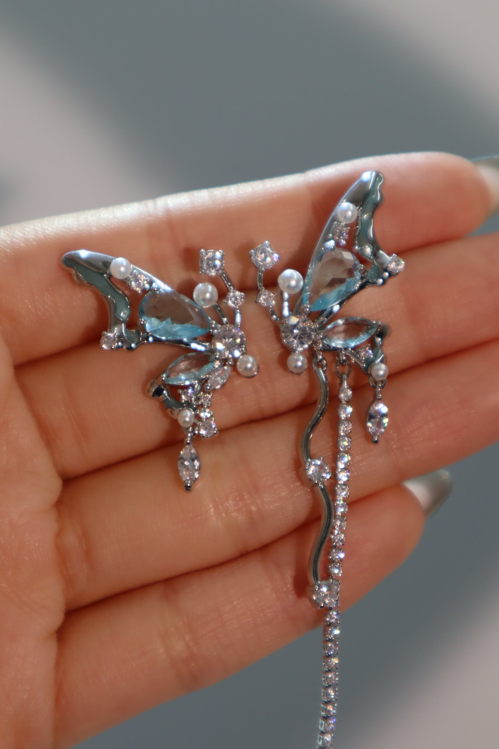 Palladium White Gold Plated Blue Gem Butterfly Earrings