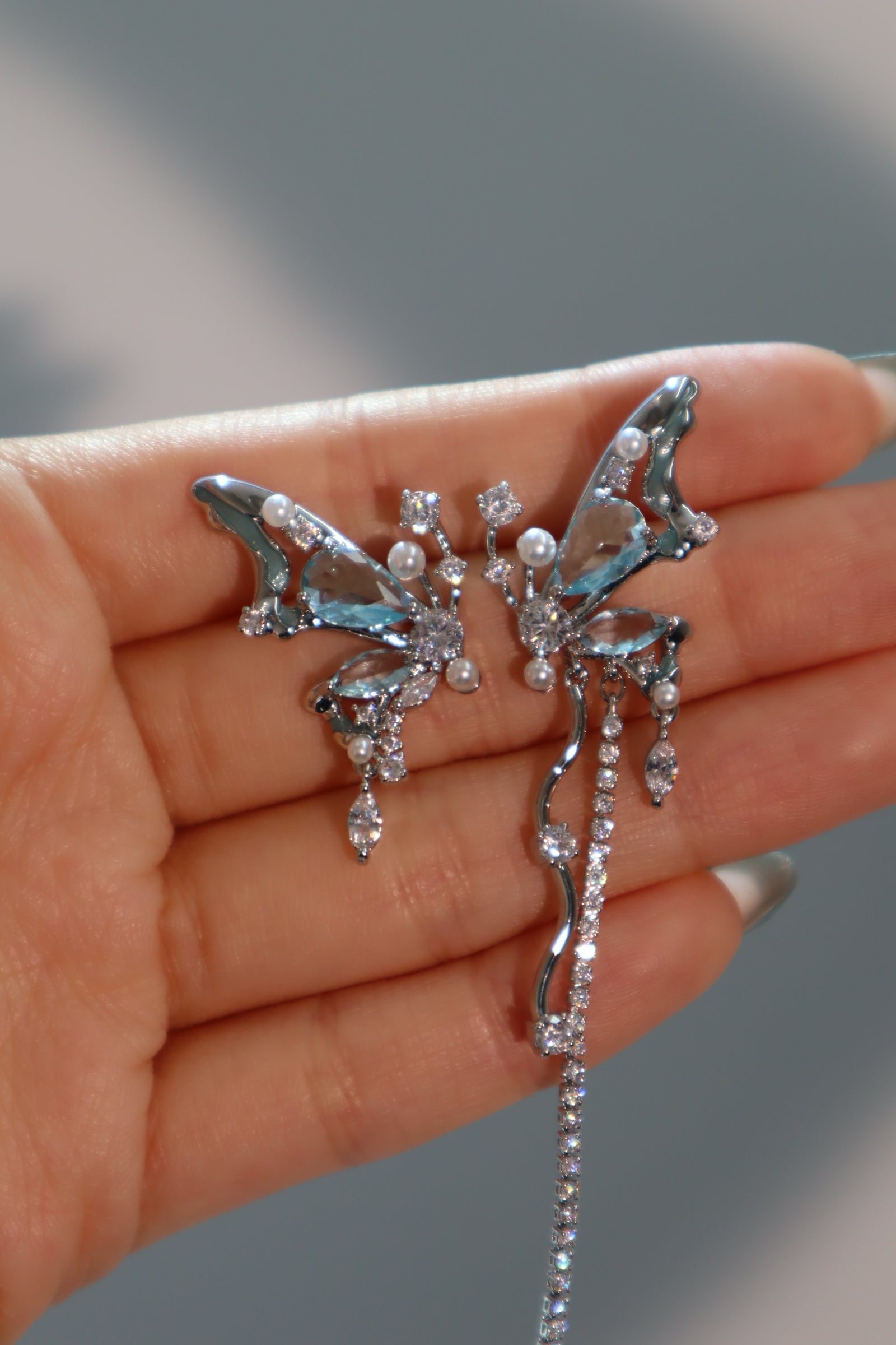 Palladium White Gold Plated Blue Gem Butterfly Earrings